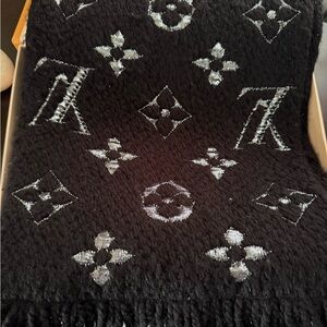 LOUIS VUITTON
Black/Silver Wool/Silk Logomania Scarf